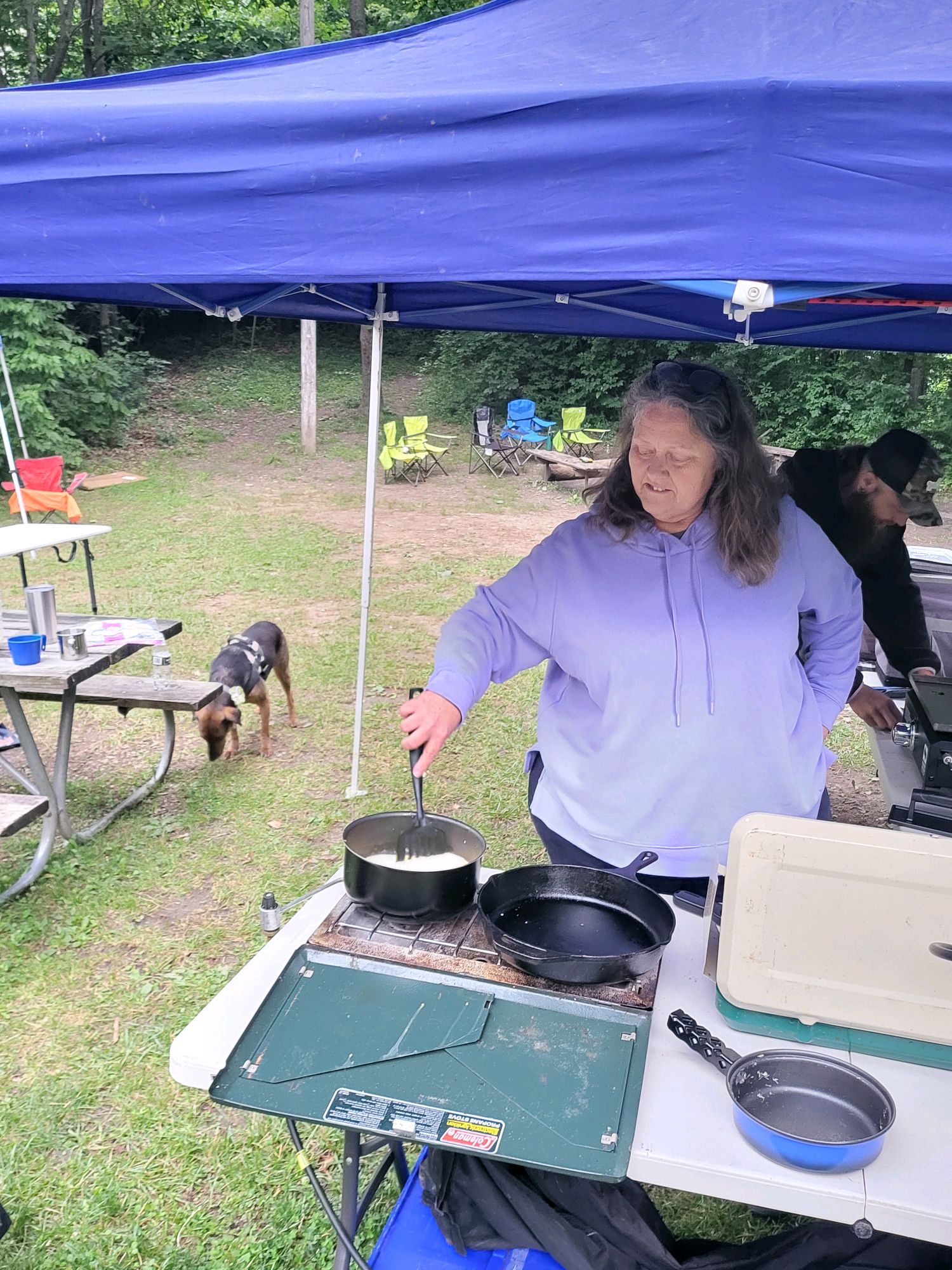 Camp kitchen setup under the canopy