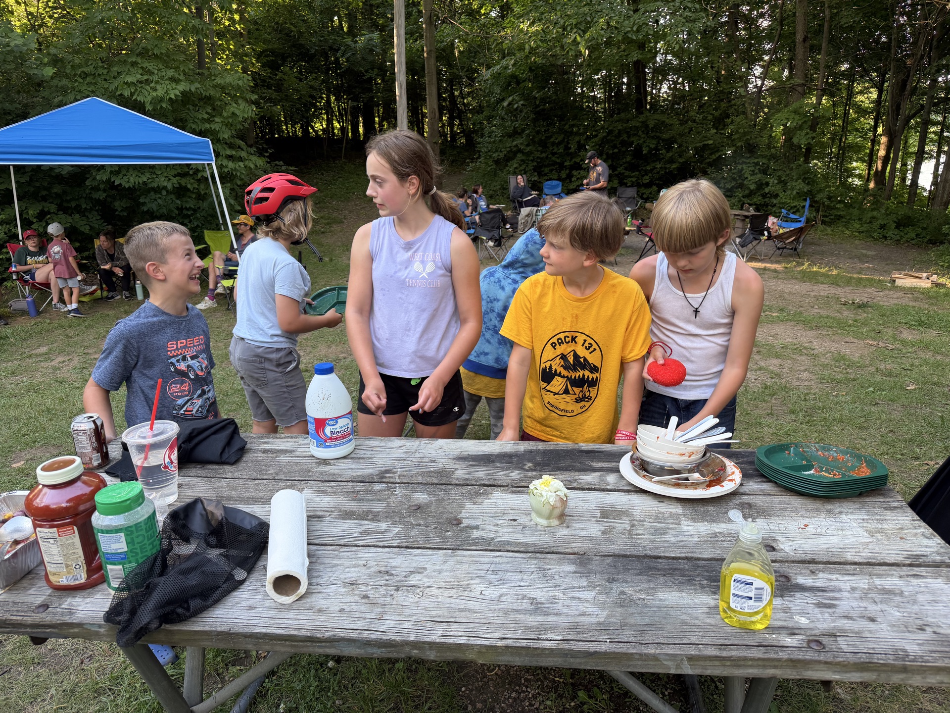 Campsite setup with tents in the woods