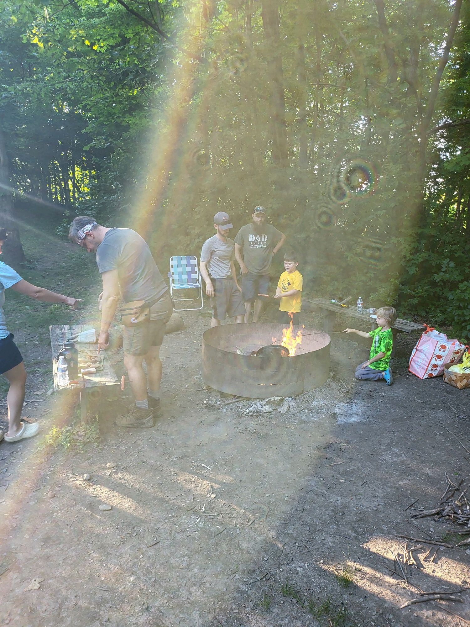 Families gathered around the campfire during evening activities