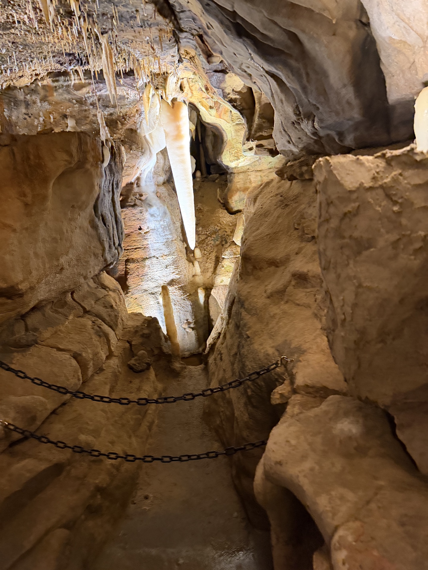 Scouts walking through the cave passage