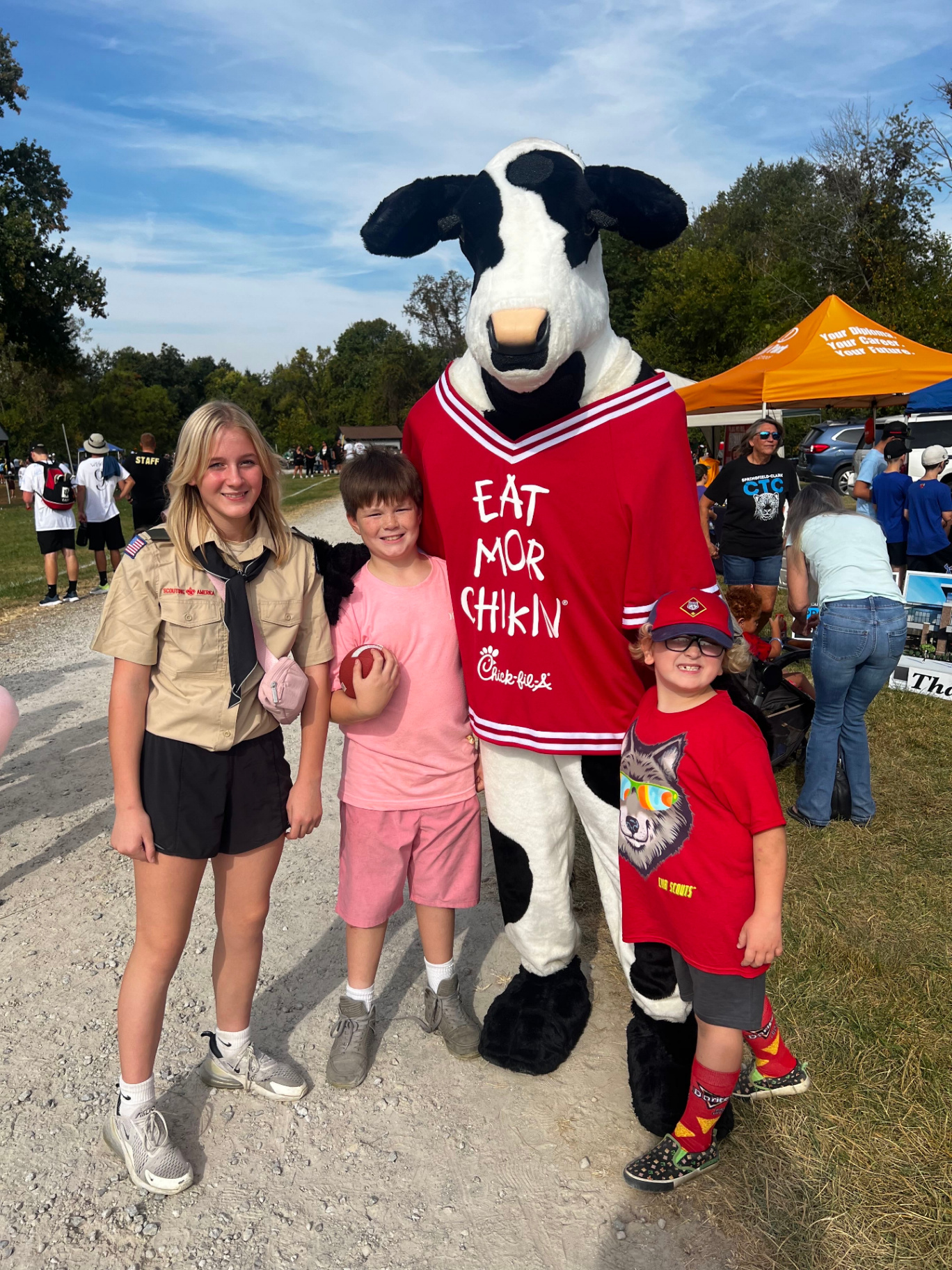 Scouts with the Chick-fil-A cow mascot